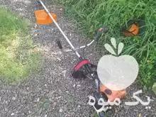 علف زنی با دستگاه پیشرفته در آستانه اشرفیه در گروه خدمات باغبانی در یکمیوه -عکس1