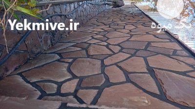 اجرای دیوار سنگی حیاط در گروه سازنده در یکمیوه -عکس2