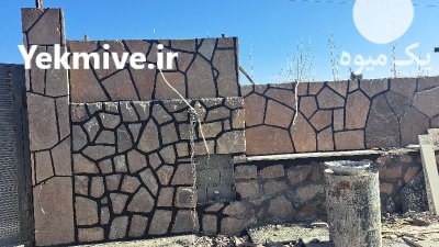 اجرای محوطه سازی سنگی با سنگ در تهران در گروه سازنده در یکمیوه -عکس4