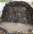 اجرای دیوار سنگی در گروه سازنده در یکمیوه