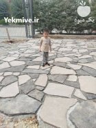 اجرای محوطه سازی سنگی در گروه سازنده در یکمیوه