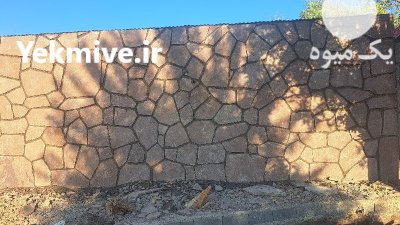 اجرای دیوار سنگی با بهترین قیمت در تهران در گروه سازنده در یکمیوه -عکس2