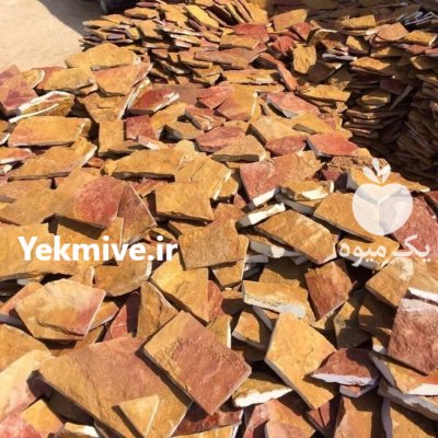 اجرای سنگ لاشه ورقه ای در بومهن در گروه سازنده در یکمیوه -عکس2