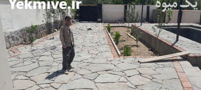 اجرای محوطه سازی سنگی در تهران در گروه سازنده در یکمیوه -عکس2
